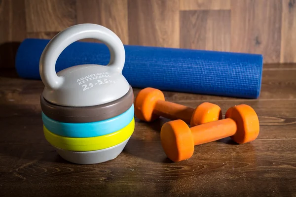 depositphotos_105017754-stock-photo-adjustable-kettlebell-pair-of-orange